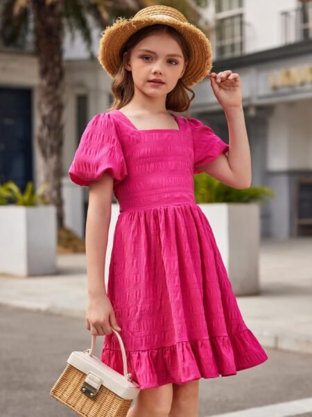 Vestido de niña con espalda semi descubierta