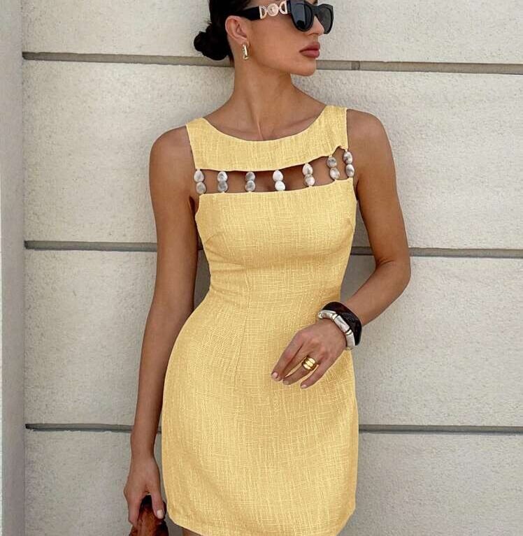 Vestido corto linea A sin mangas con cuentas