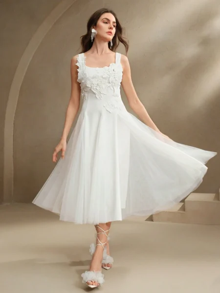 Vestido elegante con aplique floral y falda amplia con tul