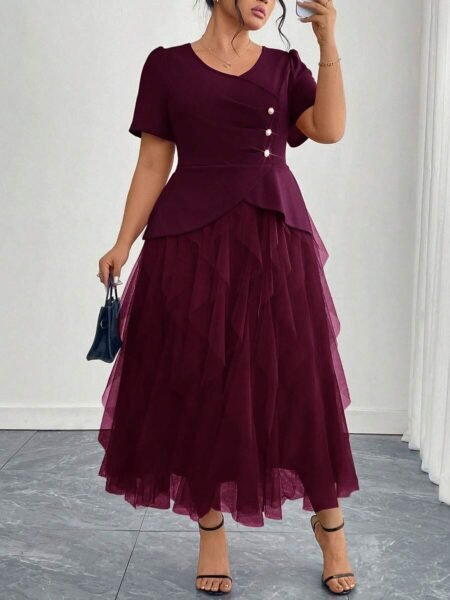 Vestido elegante de manga corta con diseño de botones y dobladillo de malla